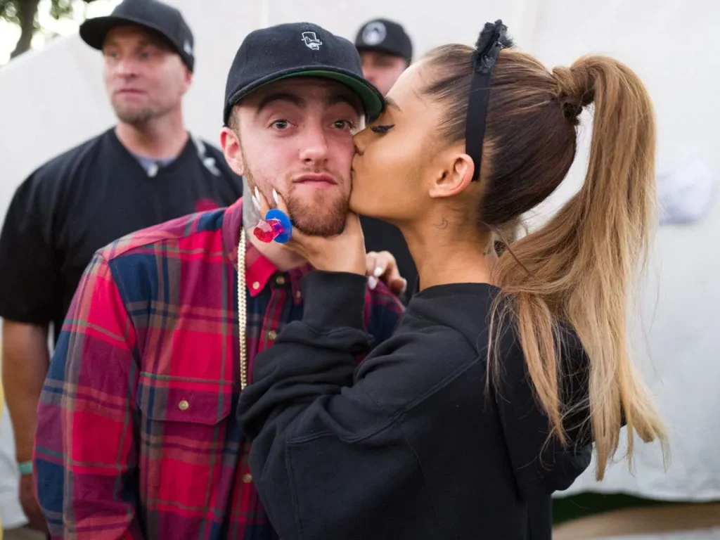 <section data-ag-atx-quick aria-label="Quick Read — Ariana Grande and Mac Miller"><style>[data-ag-atx-quick]{  --ink:#1A202C;--brand:#215387;--line:#D0D5DB;--bg:#F7FAFC;--radius:12px;  --font:Montserrat,system-ui,-apple-system,"Segoe UI",Roboto,Arial,sans-serif;  font-family:var(--font);color:var(--ink);background:var(--bg);contain:style;}[data-ag-atx-quick] *{box-sizing:border-box;}[data-ag-atx-quick] .agatq-wrap{max-width:880px;margin:0 auto;padding:10px 0;}[data-ag-atx-quick] .agatq-card{border:1px solid var(--line);border-radius:var(--radius);background:#fff;padding:12px 14px;box-shadow:0 2px 10px rgba(7,16,43,.05);}[data-ag-atx-quick] .agatq-heading{font-size:14px;margin:0 0 10px;font-weight:800;color:var(--brand);letter-spacing:.25px;text-transform:uppercase;line-height:1.3;}[data-ag-atx-quick] .agatq-list{list-style:none;padding:0;margin:0;display:grid;gap:2px;}[data-ag-atx-quick] .agatq-list li{position:relative;padding:5px 10px 5px 26px;font-size:14.5px;line-height:1.38;white-space:nowrap;overflow:hidden;text-overflow:ellipsis;}[data-ag-atx-quick] .agatq-list li::before{content:"•";position:absolute;left:10px;top:50%;transform:translateY(-50%);font-size:18px;font-weight:900;color:var(--brand);line-height:1;}[data-ag-atx-quick] strong{font-weight:700;}[data-ag-atx-quick] .agatq-footer{font-size:11px;color:#b0b8c4;margin:10px 0 0;font-style:italic;line-height:1.5;}@media(max-width:600px){  [data-ag-atx-quick] .agatq-list li{font-size:14px;padding:4px 9px 4px 24px;white-space:normal;}}</style><div class="agatq-wrap">  <div class="agatq-card">    <h2 class="agatq-heading">Ariana Grande & Mac Miller — Their Story</h2>    <ul class="agatq-list">      <li><strong>How they met:</strong> Connected on Twitter in 2012 · first collaborated on "The Way" (2013) · friends for four years before dating.</li>      <li><strong>The relationship:</strong> Dated August 2016 – May 2018 · Miller attended One Love Manchester (2017) · Grande called him "one of her favourite people."</li>      <li><strong>His passing:</strong> Mac Miller died September 7, 2018 · accidental drug overdose · age 26 · Grande called him "an angel" in "thank u, next."</li>      <li><strong>His legacy:</strong> Eternal Sunshine (2024) title references Miller's favourite film · he shaped her R&B sound from her very first single.</li>    </ul>    <p class="agatq-footer">Malcolm McCormick (Mac Miller) · Jan 19, 1992 – Sept 7, 2018 · All facts sourced to named publications</p>  </div></div></section>What changed: heading label and all 4 bullets updated to match the Mac Miller article — chronological facts, his passing reported with the same gravity as the article, and the Eternal Sunshine tribute in the final bullet.What didn't change: every CSS variable, class name, grid layout, bullet style, font stack, border radius, box shadow, footer styling, and mobile breakpoint — copied exactly as supplied.