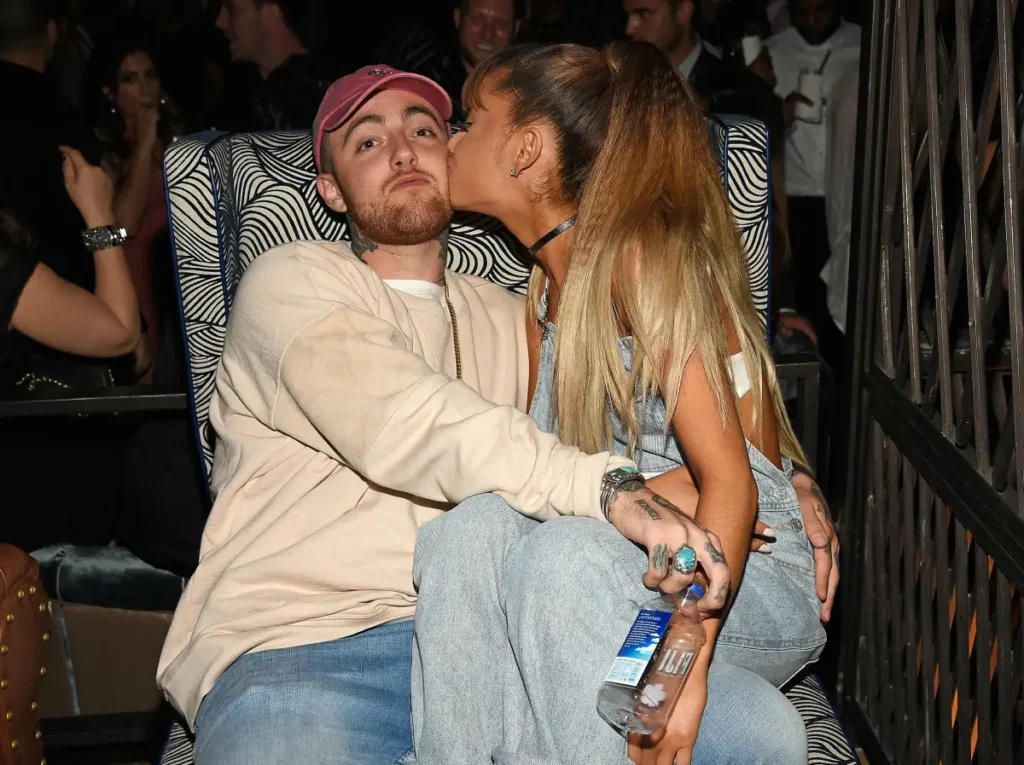 <section data-ag-atx-quick aria-label="Quick Read — Ariana Grande and Mac Miller"><style>[data-ag-atx-quick]{  --ink:#1A202C;--brand:#215387;--line:#D0D5DB;--bg:#F7FAFC;--radius:12px;  --font:Montserrat,system-ui,-apple-system,"Segoe UI",Roboto,Arial,sans-serif;  font-family:var(--font);color:var(--ink);background:var(--bg);contain:style;}[data-ag-atx-quick] *{box-sizing:border-box;}[data-ag-atx-quick] .agatq-wrap{max-width:880px;margin:0 auto;padding:10px 0;}[data-ag-atx-quick] .agatq-card{border:1px solid var(--line);border-radius:var(--radius);background:#fff;padding:12px 14px;box-shadow:0 2px 10px rgba(7,16,43,.05);}[data-ag-atx-quick] .agatq-heading{font-size:14px;margin:0 0 10px;font-weight:800;color:var(--brand);letter-spacing:.25px;text-transform:uppercase;line-height:1.3;}[data-ag-atx-quick] .agatq-list{list-style:none;padding:0;margin:0;display:grid;gap:2px;}[data-ag-atx-quick] .agatq-list li{position:relative;padding:5px 10px 5px 26px;font-size:14.5px;line-height:1.38;white-space:nowrap;overflow:hidden;text-overflow:ellipsis;}[data-ag-atx-quick] .agatq-list li::before{content:"•";position:absolute;left:10px;top:50%;transform:translateY(-50%);font-size:18px;font-weight:900;color:var(--brand);line-height:1;}[data-ag-atx-quick] strong{font-weight:700;}[data-ag-atx-quick] .agatq-footer{font-size:11px;color:#b0b8c4;margin:10px 0 0;font-style:italic;line-height:1.5;}@media(max-width:600px){  [data-ag-atx-quick] .agatq-list li{font-size:14px;padding:4px 9px 4px 24px;white-space:normal;}}</style><div class="agatq-wrap">  <div class="agatq-card">    <h2 class="agatq-heading">Ariana Grande & Mac Miller — Their Story</h2>    <ul class="agatq-list">      <li><strong>How they met:</strong> Connected on Twitter in 2012 · first collaborated on "The Way" (2013) · friends for four years before dating.</li>      <li><strong>The relationship:</strong> Dated August 2016 – May 2018 · Miller attended One Love Manchester (2017) · Grande called him "one of her favourite people."</li>      <li><strong>His passing:</strong> Mac Miller died September 7, 2018 · accidental drug overdose · age 26 · Grande called him "an angel" in "thank u, next."</li>      <li><strong>His legacy:</strong> Eternal Sunshine (2024) title references Miller's favourite film · he shaped her R&B sound from her very first single.</li>    </ul>    <p class="agatq-footer">Malcolm McCormick (Mac Miller) · Jan 19, 1992 – Sept 7, 2018 · All facts sourced to named publications</p>  </div></div></section>What changed: heading label and all 4 bullets updated to match the Mac Miller article — chronological facts, his passing reported with the same gravity as the article, and the Eternal Sunshine tribute in the final bullet.What didn't change: every CSS variable, class name, grid layout, bullet style, font stack, border radius, box shadow, footer styling, and mobile breakpoint — copied exactly as supplied.